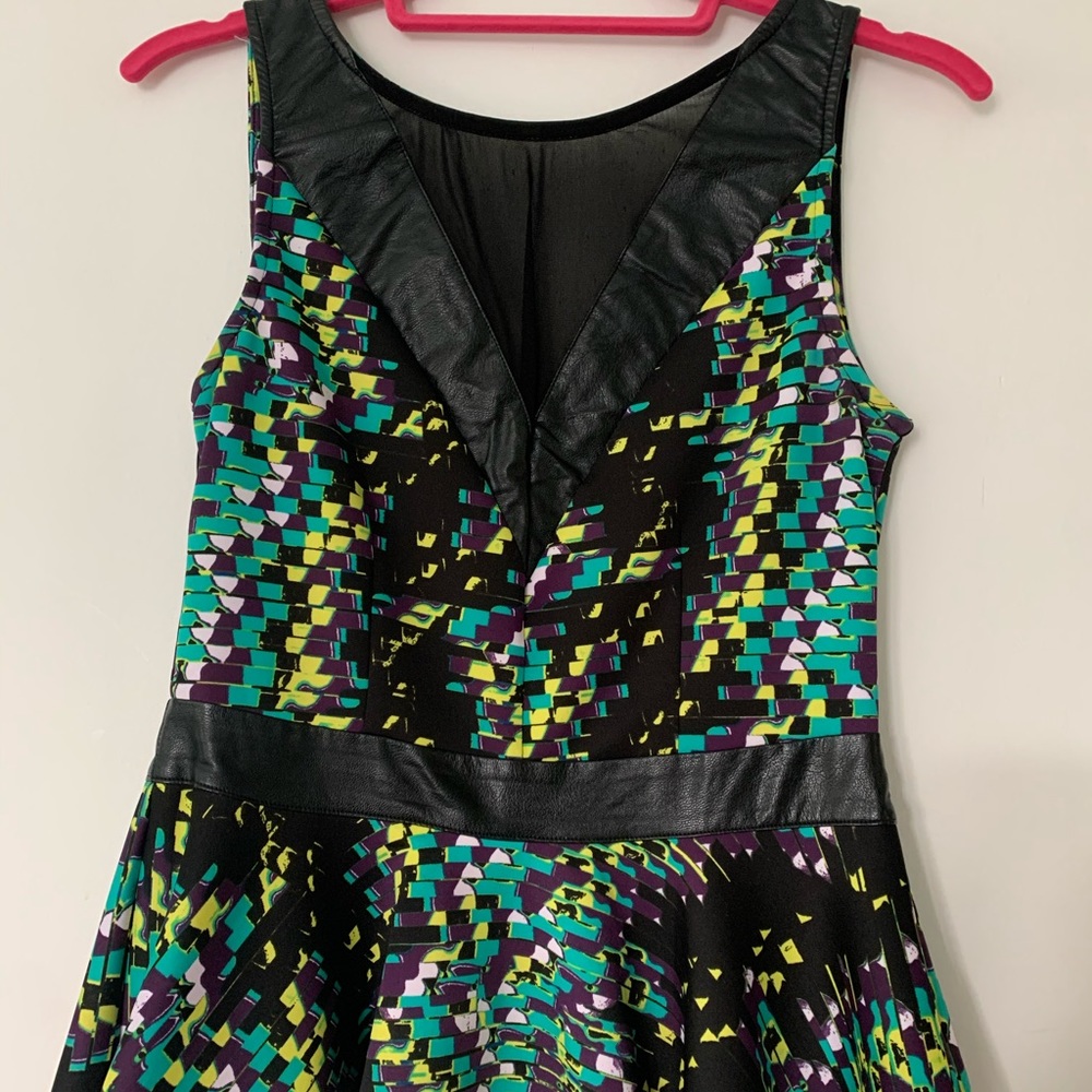Bebe peplum back zip top